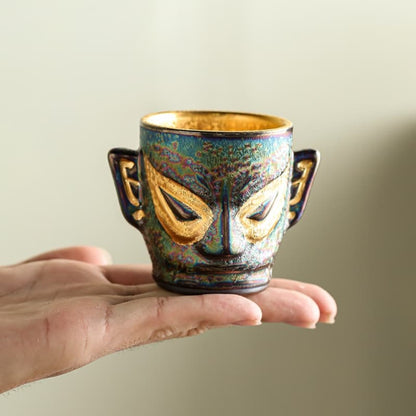 【Tea cup】Gilded teacup with the style of Sanxingdui masks