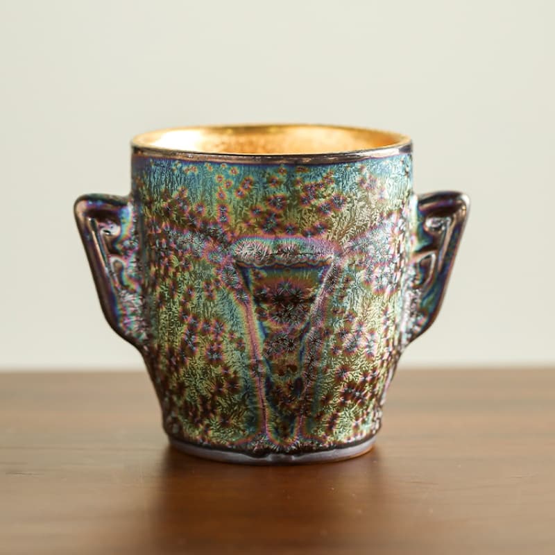 【Tea cup】Gilded teacup with the style of Sanxingdui masks